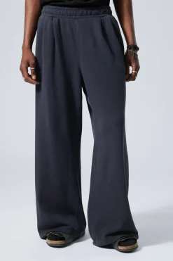 Weekday LOOSE WIDE HEAVYWEIGHT SWEATPANTS washed dark blue New