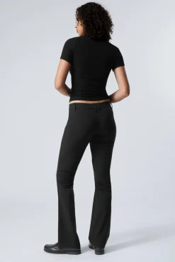 Weekday SLIM LOW WAIST FLARED PLEATED TROUSERS black Cheap